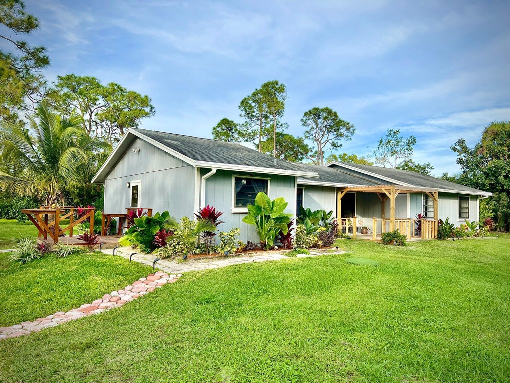 Photo of 12809 Sunset Boulevard, The Acreage, FL 33411 (MLS # R10946086)