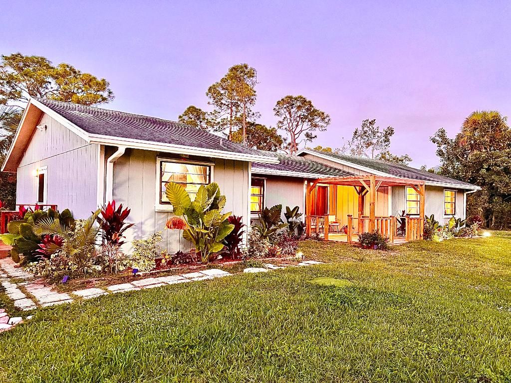 Photo of 12809 Sunset Boulevard, The Acreage, FL 33411 (MLS # R10946086)