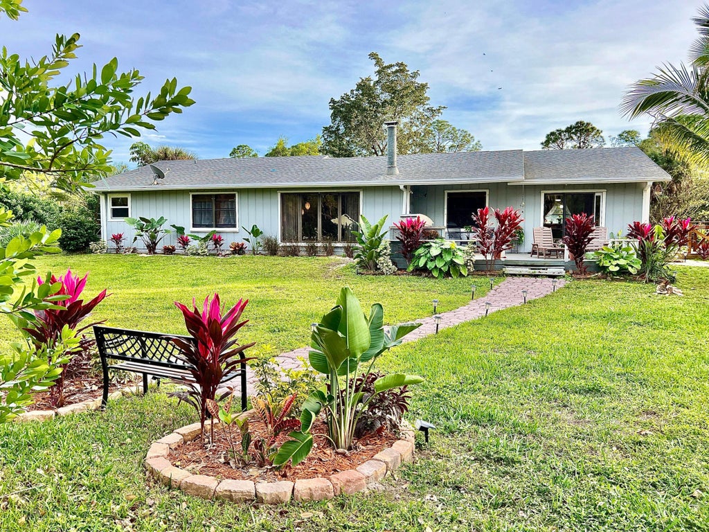 Photo of 12809 Sunset Boulevard, The Acreage, FL 33411 (MLS # R10946086)