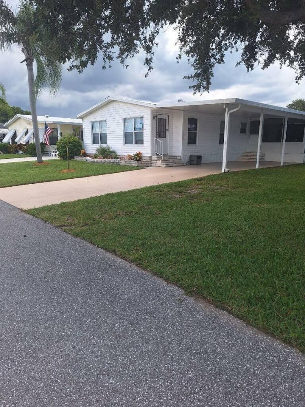 Photo of 13970 Adelfa Ave, Fort Pierce, FL 34951 (MLS # R11098594)