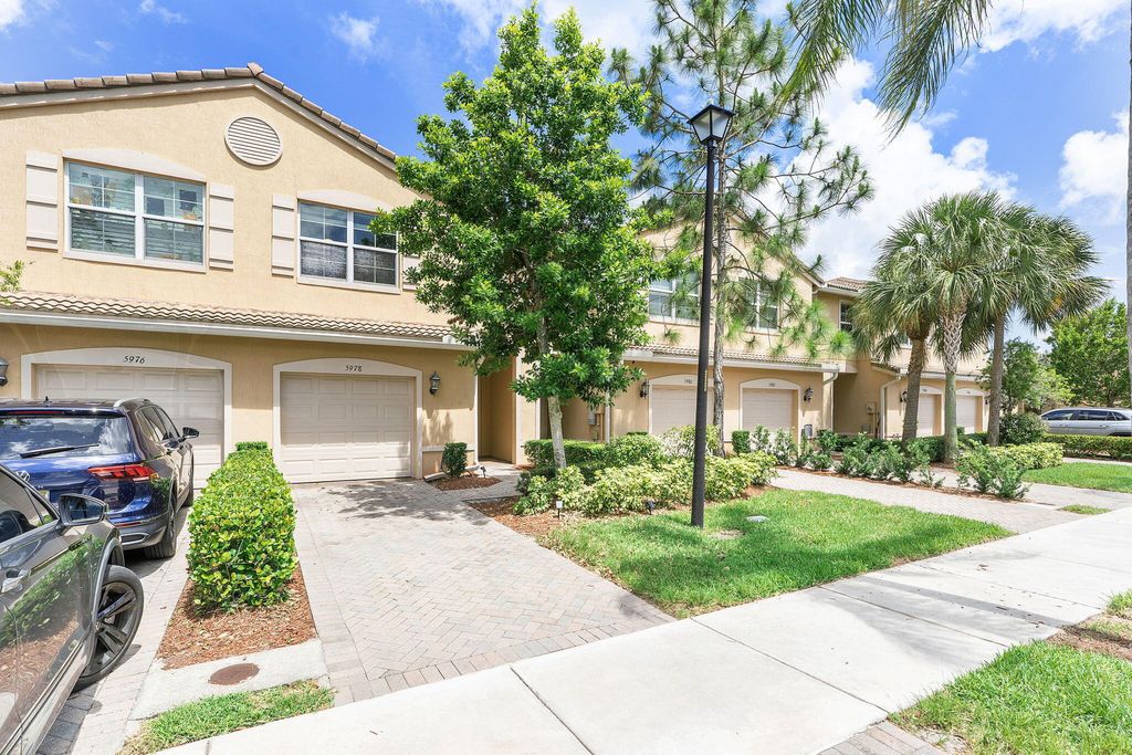 Photo of 5978 Monterra Club Drive, Lake Worth, FL 33463 (MLS # B26033860)