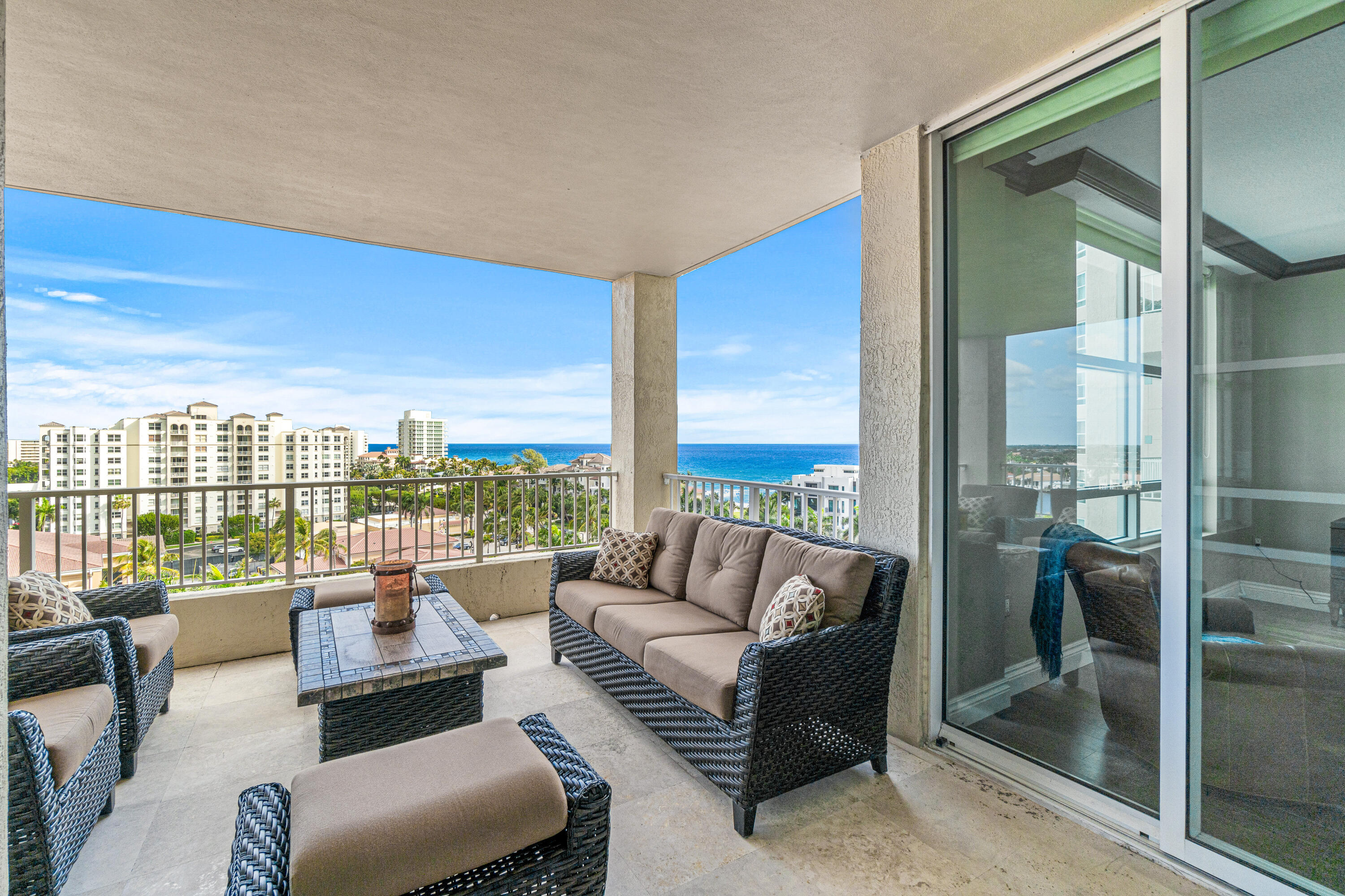 A private elevator opens to your foyer, where you enter the double doors into this light and bright Siena model unit at Toscana North. Impact glass floor to ceiling sliding doors lead to 2 spacious private balconies with spectacular Ocean and Intracoastal views. This 2 bedroom plus den condo has been recently upgraded with wood floors in both bedrooms. Large Master Suite features spacious walk-in closets and access to the North balcony. Kitchen boasts large pantry and access to the South balcony. Toscana is a gated 5 STAR RESORT CONDOMINIUM which offers full concierge service. It has 2 clay tennis courts, 3 pools, shuffleboard and barbeque area. The private beach club which is just across the street, has been beautifully renovated.
