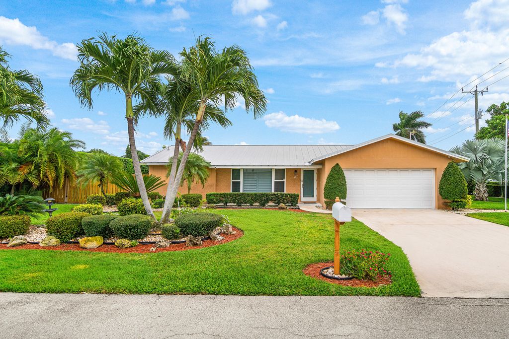 Photo of 400 NE 43rd Street, Boca Raton, FL 33431 (MLS # B26013578)