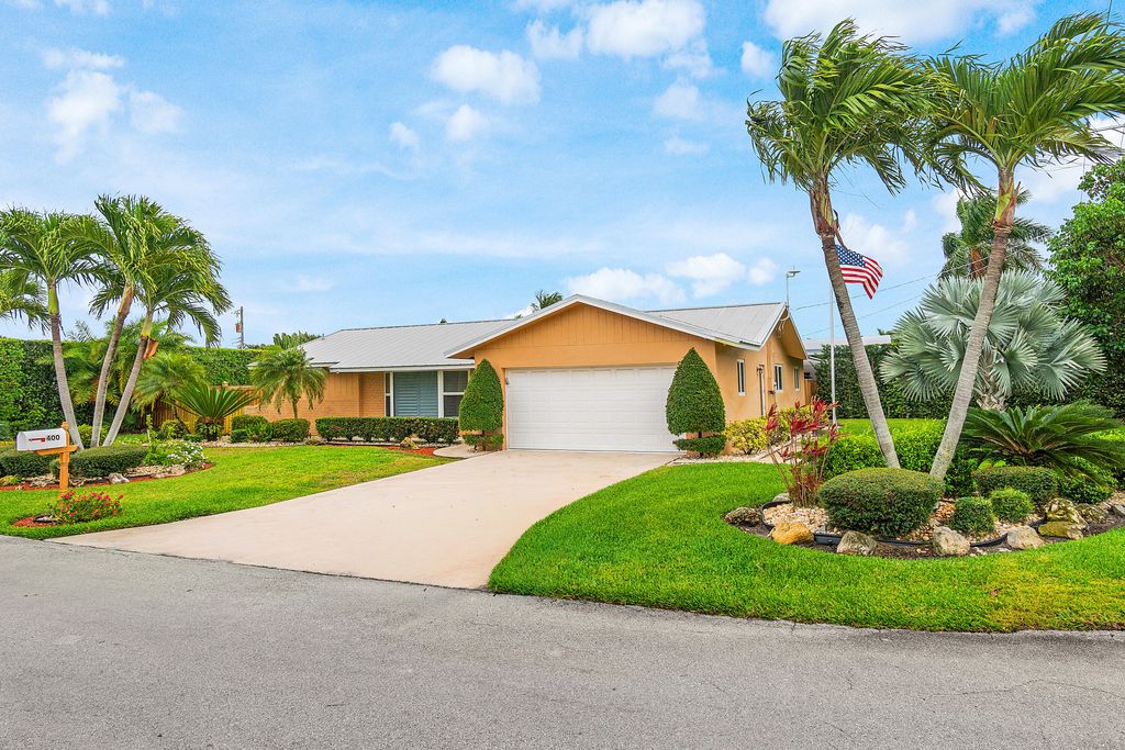 Photo of 400 NE 43rd Street, Boca Raton, FL 33431 (MLS # B26013578)