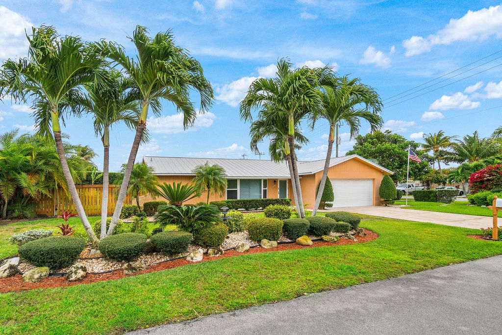 Photo of 400 NE 43rd Street, Boca Raton, FL 33431 (MLS # B26013578)