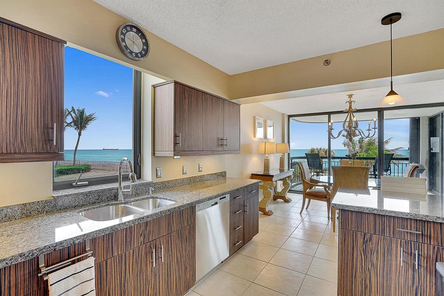 Singer Island Oceanfront Condo-Priced Below Market! Spectacular 180 panoramic ocean views from this entire east side 3BR/3.1BA condo. Light-filled great room with floor-to-ceiling windows, granite kitchen w/ island, 3 balconies, laundry room & garage parking. Resort-style living with 24/7 gate & concierge, new ocean lounge & fitness center, heated pool, hot tub, billiards & 3 tennis courts. A short distance to restaurants and shops. Recent building upgrades include lobby, lounge, seawall & more. Direct oceanfront luxury at an unbeatable value! Assessments to be paid by seller.