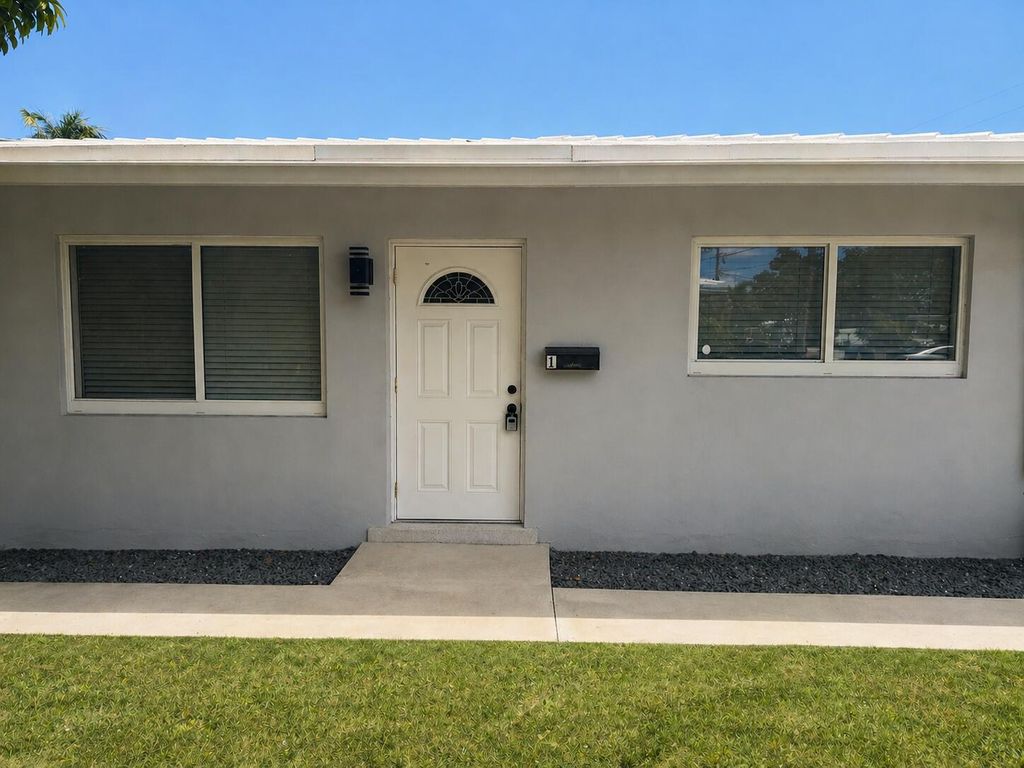 Photo of 1077 NE 34th Street #1, Oakland Park, FL 33334 (MLS # B26020778)