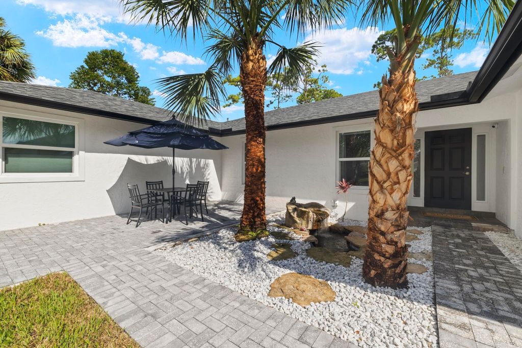 Photo of 12151 Old Country Road N, Wellington, FL 33414 (MLS # B26003508)