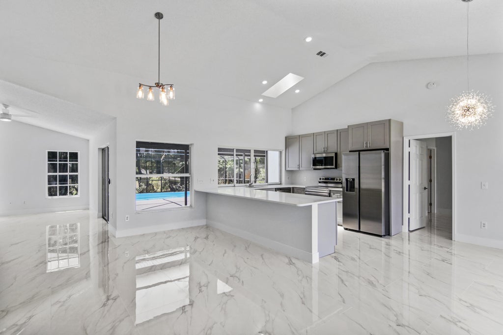 Photo of 1650 SW Mercedes Avenue, Port Saint Lucie, FL 34953 (MLS # R11084218)