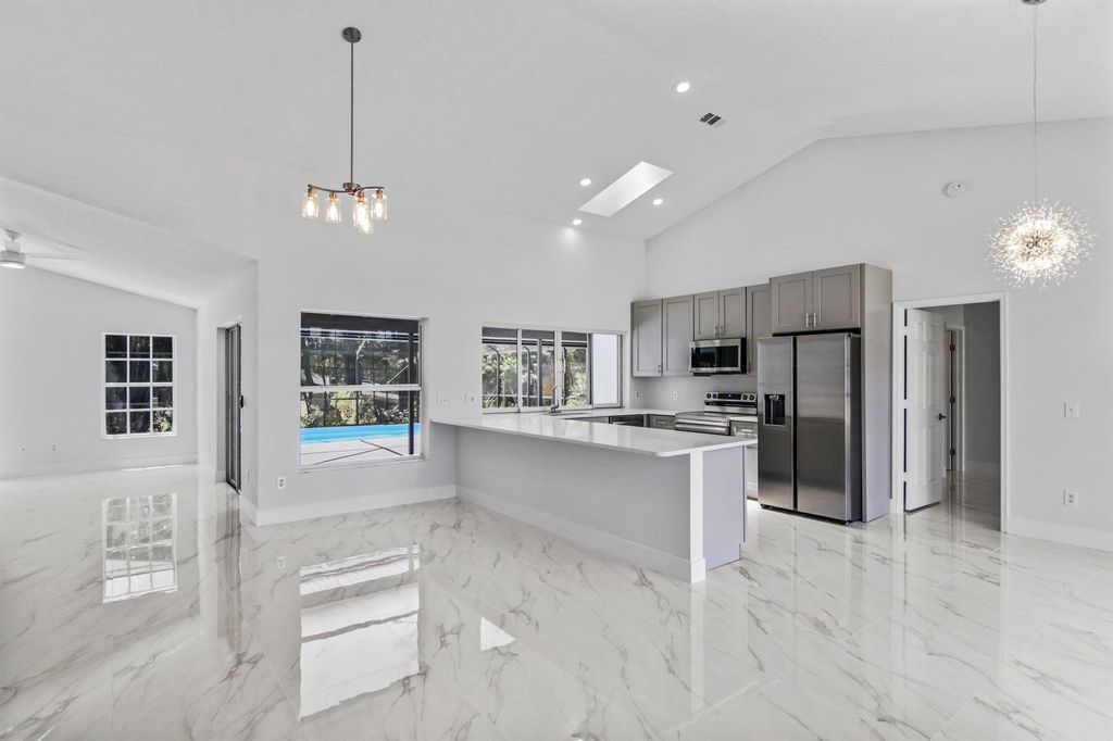 Photo of 1650 SW Mercedes Avenue, Port Saint Lucie, FL 34953 (MLS # R11084218)