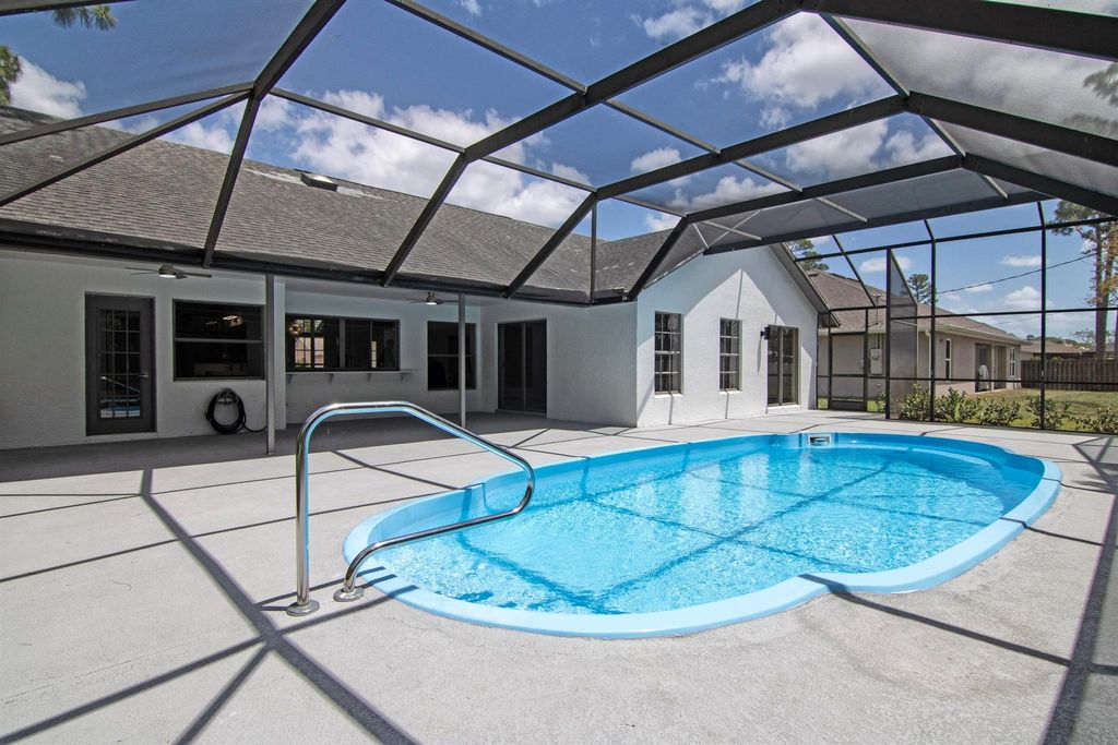 Photo of 1650 SW Mercedes Avenue, Port Saint Lucie, FL 34953 (MLS # R11084218)