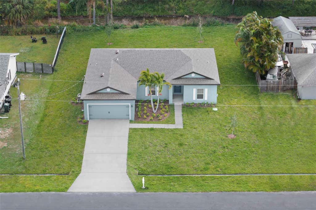 Photo of 1631 SE Nancy Lane, Port Saint Lucie, FL 34983 (MLS # F10486891)