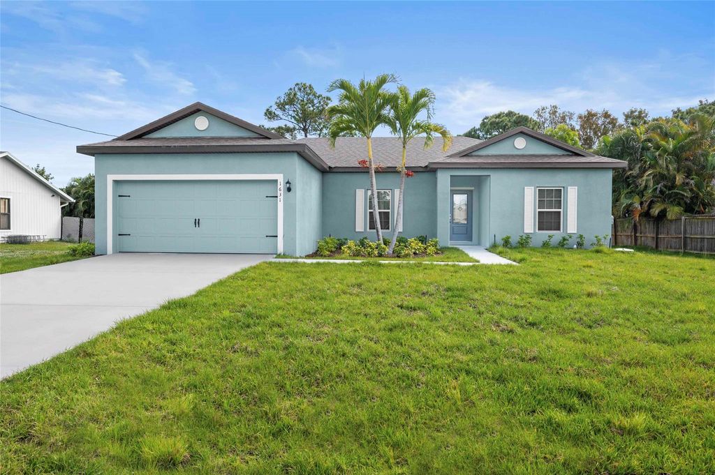 Photo of 1631 SE Nancy Lane, Port Saint Lucie, FL 34983 (MLS # F10486891)