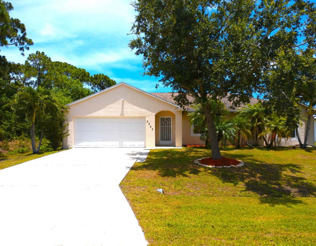 Photo of 2265 SE Belvedere Street, Port Saint Lucie, FL 34984 (MLS # R10998882)