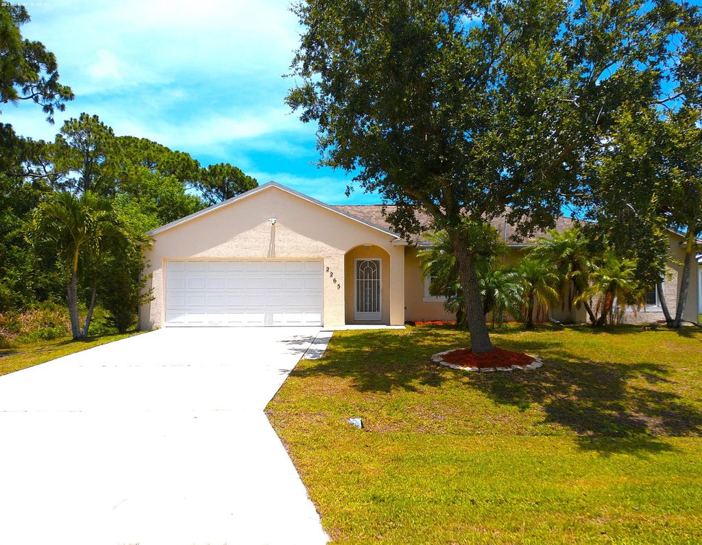 Photo of 2265 SE Belvedere Street, Port Saint Lucie, FL 34984 (MLS # R10998882)