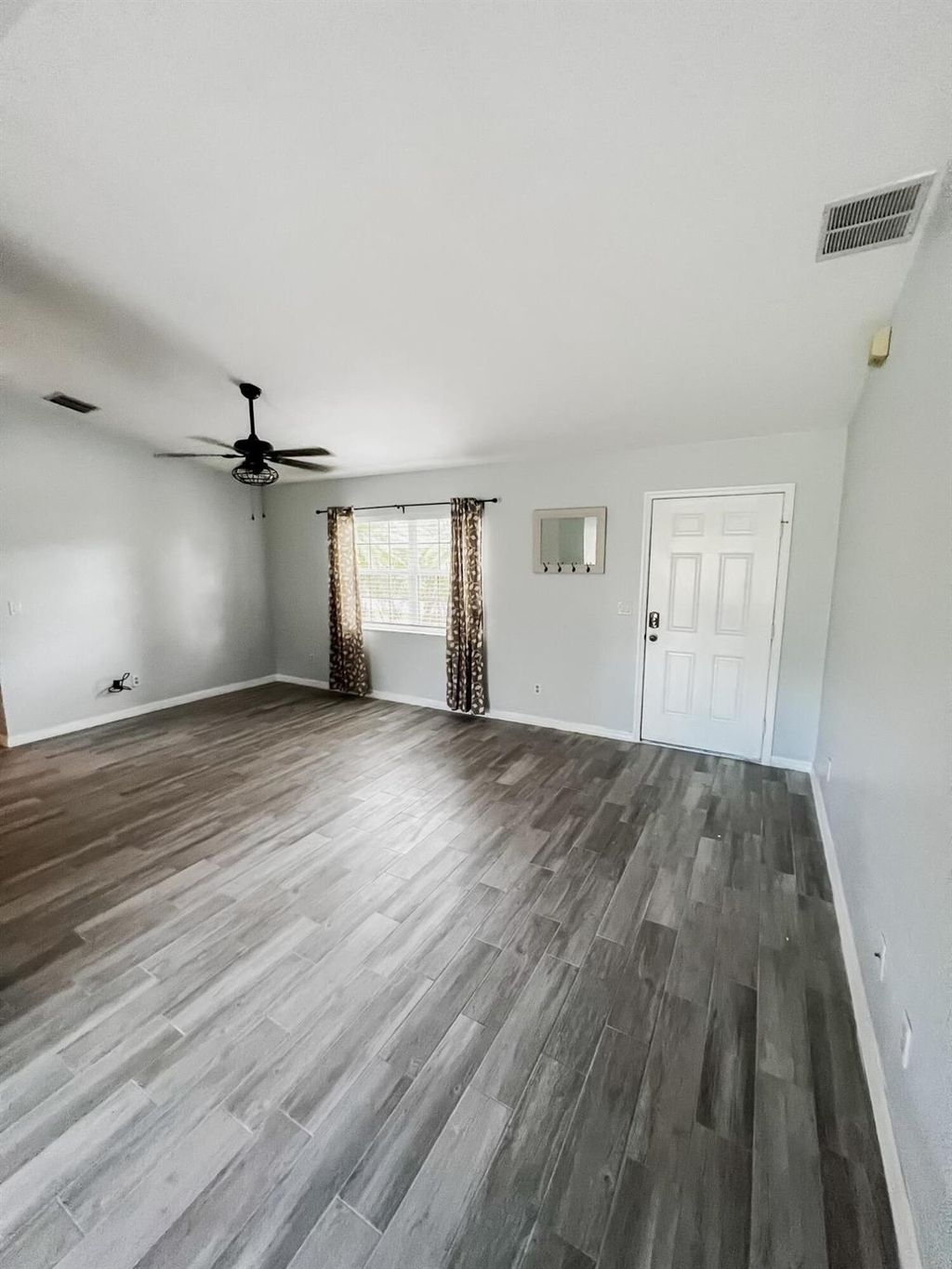 Photo of 2265 SE Belvedere Street, Port Saint Lucie, FL 34984 (MLS # R10998882)