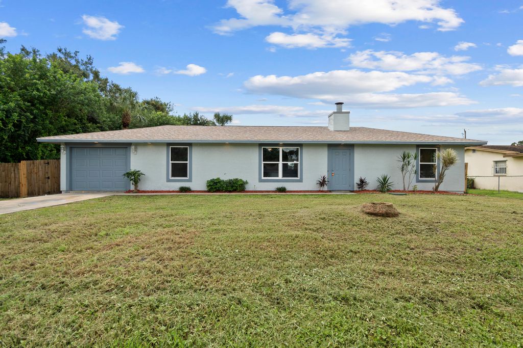 Photo of 7703 Santana Avenue, Fort Pierce, FL 34951 (MLS # R11020810)