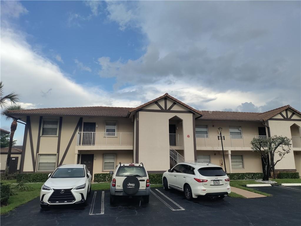 WHAT A BEAUTY!!! PARTIALLY REMODELED CORNER UNIT CONDO WITH PLENTY OF WINDOWS, SECOND FLOOR LOCATION, REMODELED BATHROOMS, WALK IN CLOSET IN MASTER BEDROOM, ACCORDION SHUTTERS, SCREENED PATIO, STORAGE ROOM, TILE AND LAMINATED FLOORS (NO CARPET)WASHER AND DRYER IN UNIT, COMMUNITY POOL, BRAND NEW FLAT TOP RANGE AND NEWER SS APPLIANCES, GREAT LOCATION , EASY TO SHOW !!!