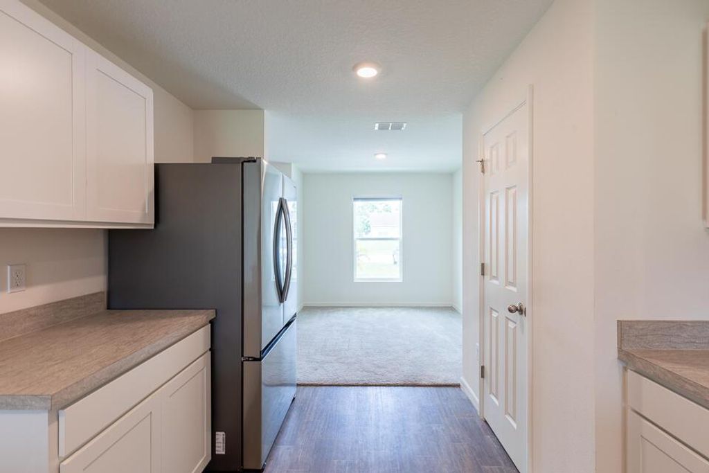 Photo of 1042 SW California Boulevard, Port Saint Lucie, FL 34953 (MLS # R11098979)