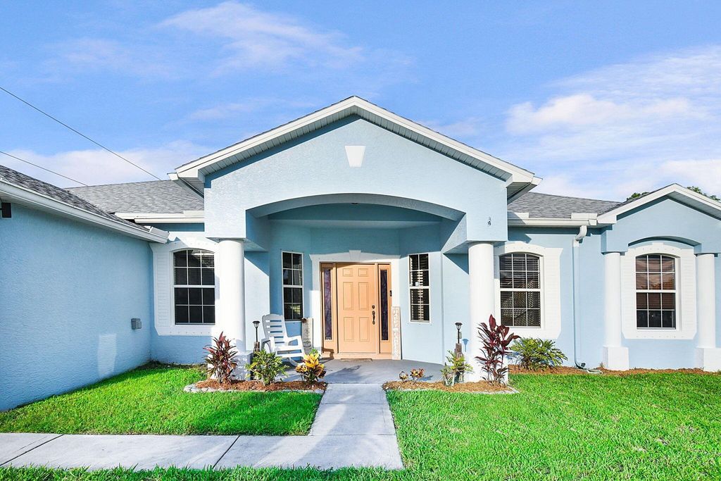 Photo of 4631 SW Eagle Street, Port Saint Lucie, FL 34953 (MLS # R11000142)