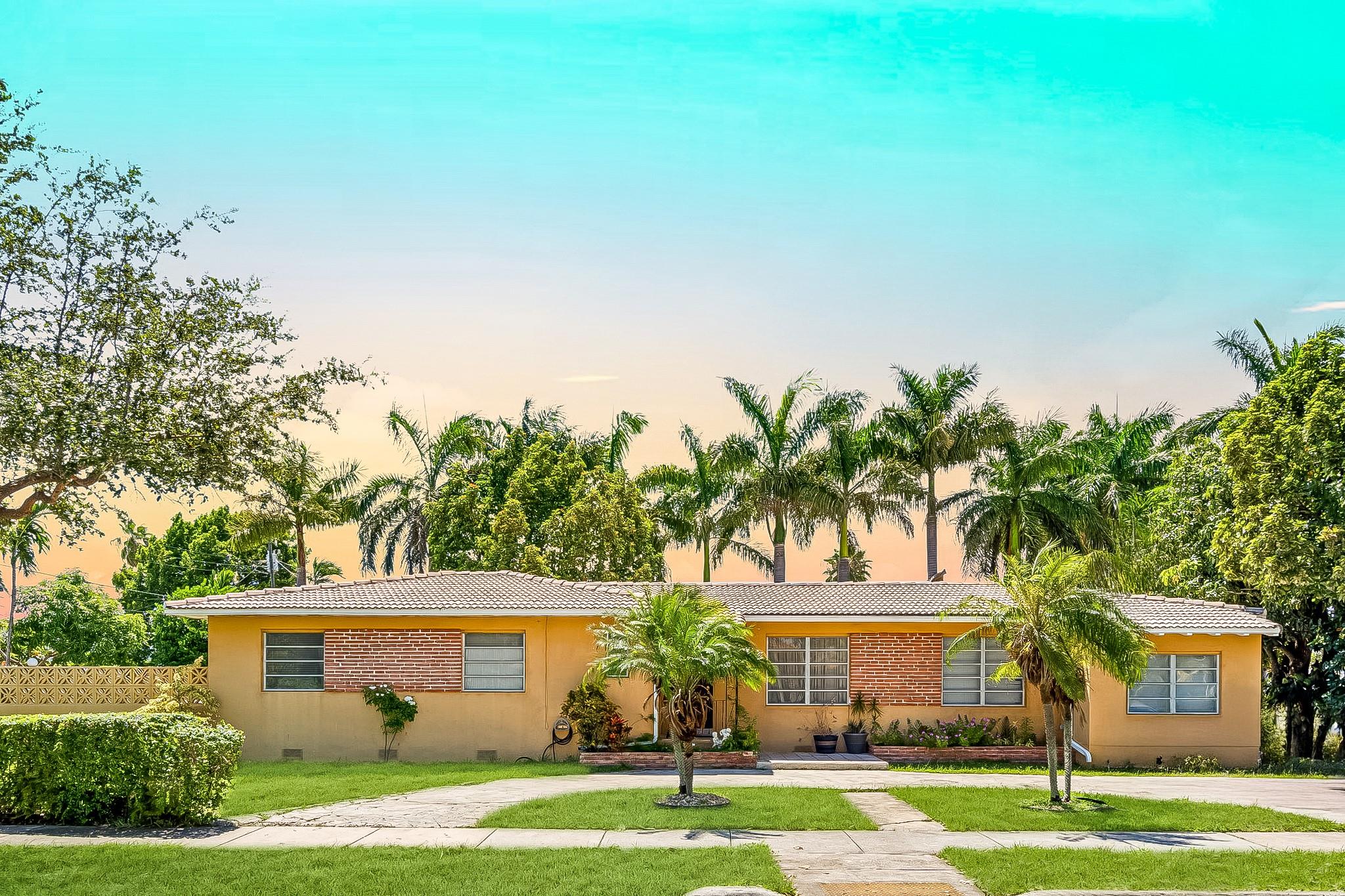 Spacious Single-Family Home on Rare Double Corner Lot Near Coconut Grove. Home is currently a 5 Bedroom 4 bath - 3/2, 1/1 and Studio plus large storage. This home sits on a double corner lot offering exceptional space, privacy, and outdoor potential. Interior features tiled floors, lush landscaping, tons of storage space, large living and family rooms, and dual kitchens—ideal for multi-generational living or entertaining. Covered and open patios, a spacious yard, and detached storage provide added functionality. A unique opportunity in a highly desirable location just outside Coconut Grove. Roof is from 2021. Broker's please read remarks.