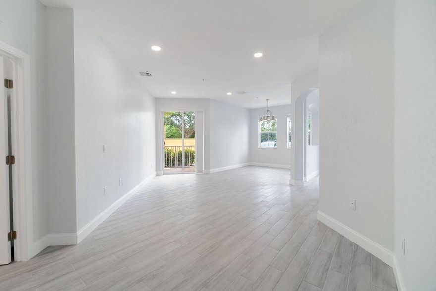 Beautiful corner condo  with a covered patio. Completely remodeled 3 bedroom 2.5 baths with lots of natural sunlight in a gated community with lots of amenities and top rated schools. The entire condo has ceramic wood tile,  freshly painted, entire kitchen was replaced with granite counters, soft closing cabinets and new stainless steel appliances. All bathrooms new vanities and have been updated. Owner has upgraded every little detail, so just bring you belongings and move on in!