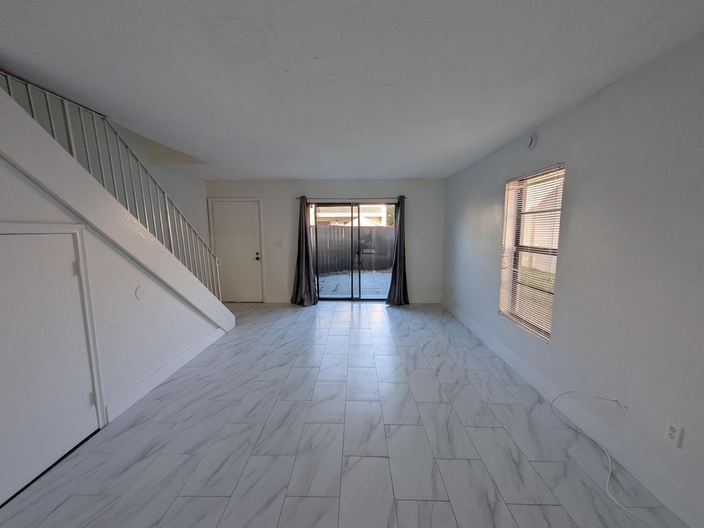 Photo of 2456 NW 52nd Avenue #2456, Lauderhill, FL 33313 (MLS # B26003813)