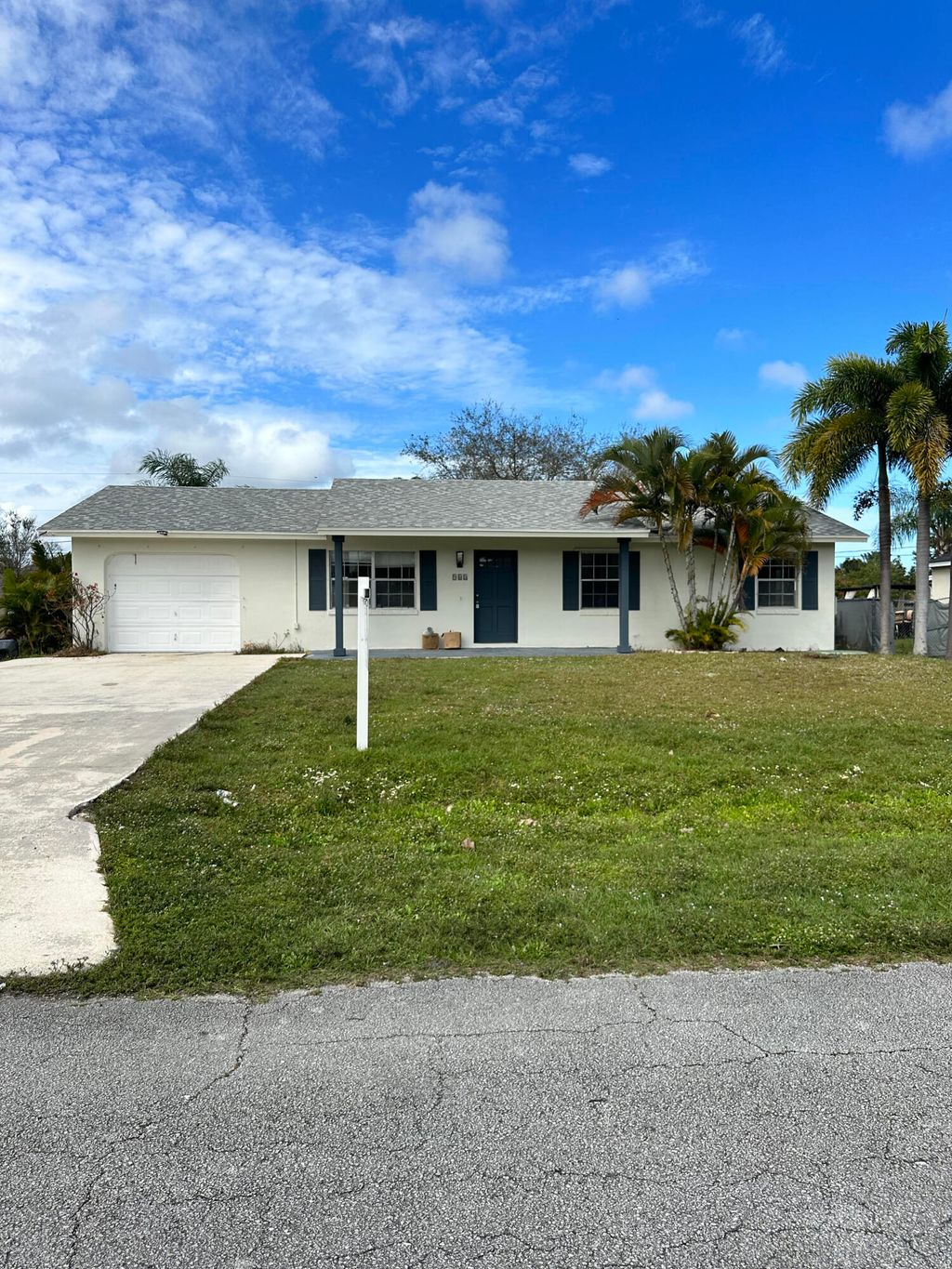 Photo of 965 SE Caravan Avenue, Port Saint Lucie, FL 34983 (MLS # R11159183)