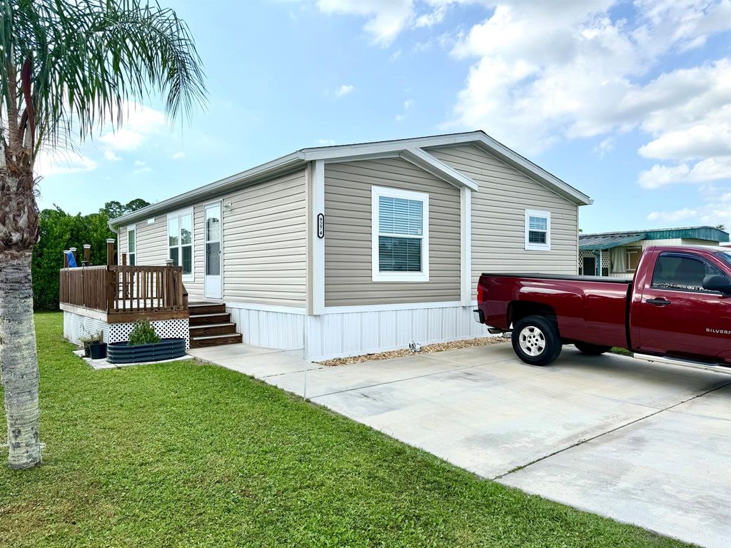 Photo of 9274 SW Mary Dr E, Stuart, FL 34997 (MLS # R11139242)