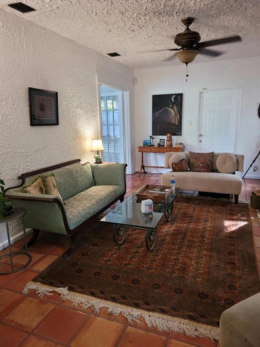 Historic Mission style Spanish, a few houses from Flagler Dr. New kitchen, new bath, new washer dryer.. Clean open spaces, oversized bedrooms., working fireplace, hurricane protection.  Close to the new Marina Village being built right now. Soon you will be able to stroll down Flagler Dr to dinner and shopping.  Lot's of new development in the immediate area, new parks, new high end condos, shops, grocery store, etc.  
Close to downtown WPB, airport, Brightline  and pristine beaches, all just a few miles away.  NOW is the best time to buy in Northwood! Pet on premises.