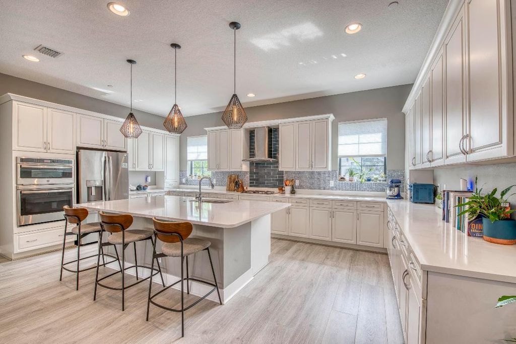 Photo of 5178 Beckman Terrace, Palm Beach Gardens, FL 33418 (MLS # R11103698)