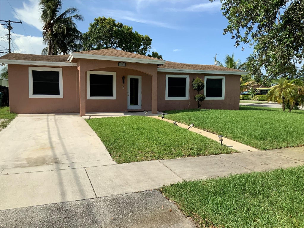 Photo of 3301 NW 17th Street, Lauderhill, FL 33311 (MLS # B26038701)