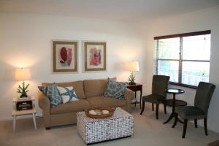 Totally furnished and turnkey...from beach chairs to coffee pot!  Renovated kitchen and bathrooms with new cabinets, granite and stainless steel.   Best kept secret in prestigious Ocean Ridge.  Roomy with plenty of storage, two large walk-in closets, 2 hall closets and storage room on screen patio. Beautiful view of green space.  Short walk to private beach.  New impact storm windows and sliding doors. Complex offers 2 clubhouses, one on the Intracoastal and one with heated pool, exercise room, billiard table and barbecue area.  Boat Docks available.  Short drive to Atlantic Ave.  Cable and water included.  All ages are welcomed. Owner requests that home remains smoke free.