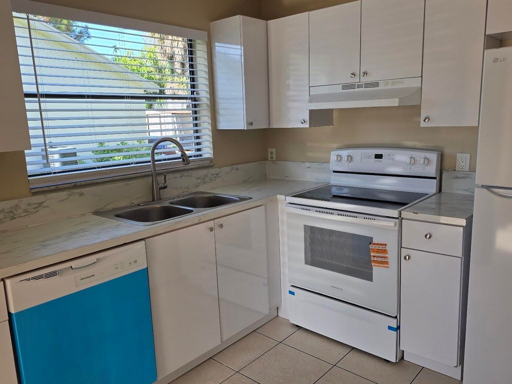 Photo of 3774 Mil Race Court, Greenacres, FL 33463 (MLS # B26006887)