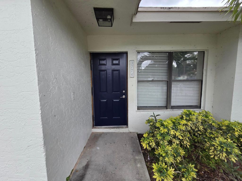 Photo of 3774 Mil Race Court, Greenacres, FL 33463 (MLS # B26006887)