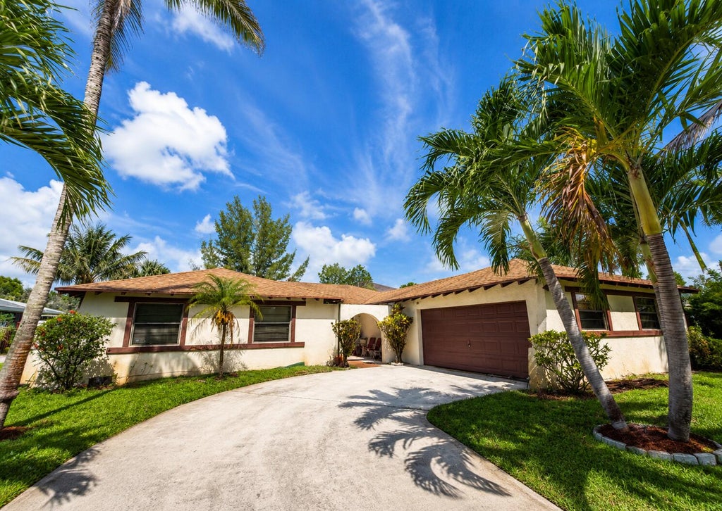 Photo of 915 Ryanwood Drive, West Palm Beach, FL 33413 (MLS # B26045466)