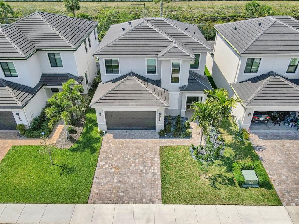 Photo of 6091 Yerba Buena Court, Lake Worth Beach, FL 33467 (MLS # R10871780)