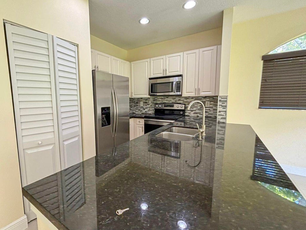 Photo of 3118 CORAL RIDGE Drive #3118, Coral Springs, FL 33065 (MLS # B26071855)
