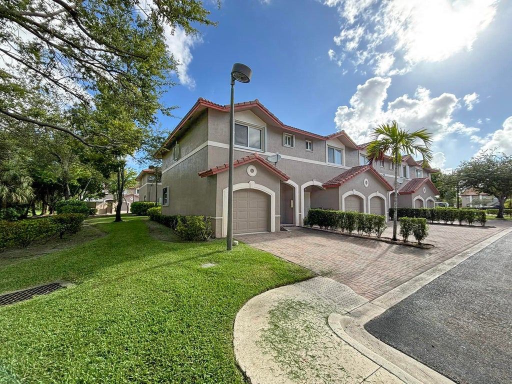 Photo of 3118 CORAL RIDGE Drive #3118, Coral Springs, FL 33065 (MLS # B26071855)