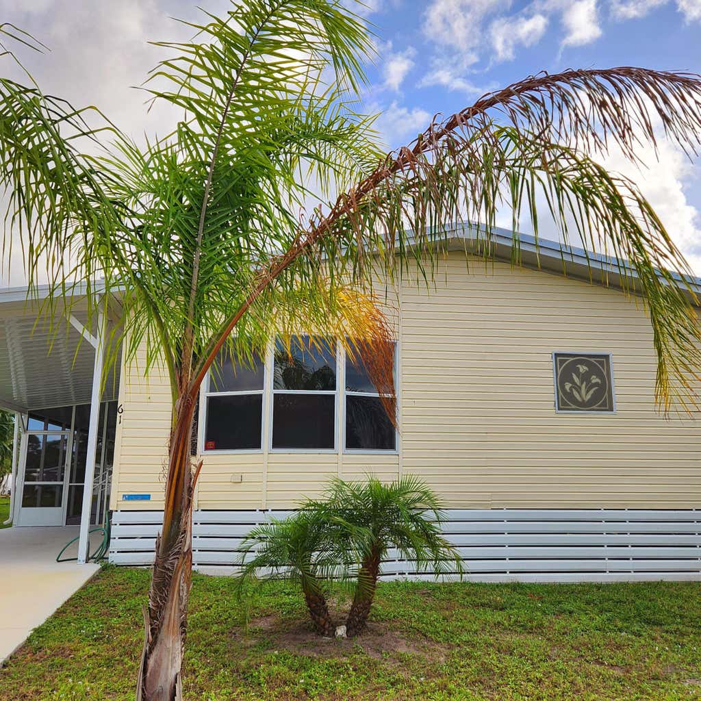 Photo of 61 W Caribbean, Port Saint Lucie, FL 34952 (MLS # R11032559)