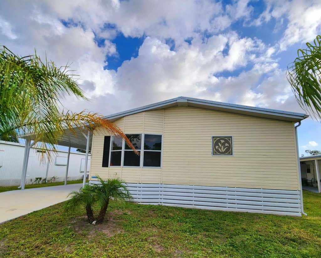 Photo of 61 W Caribbean, Port Saint Lucie, FL 34952 (MLS # R11032559)