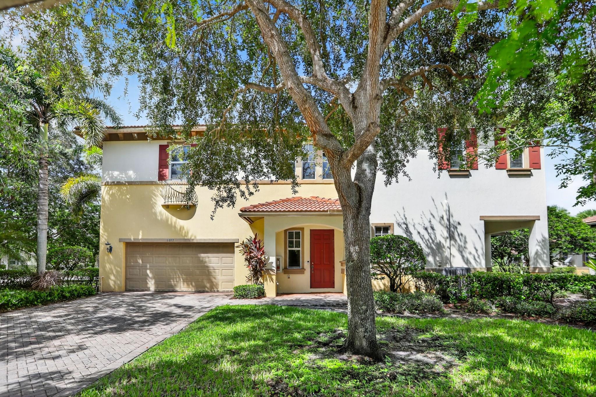 Bright & Spacious Townhome in Highly sought-after Heron Preserve, a gated community! This home features 3 bedrooms + loft, 2.5 baths, and a 2-car garage with hurricane impact windows. Inside, you’ll find fresh interior paint, 18x18 tile throughout all living areas, and Berber carpet in the bedrooms. The kitchen boasts stainless steel appliances, including a French-door refrigerator, glass-top stove with microwave, granite countertops, and wood cabinetry. The primary suite offers an oversized sitting/exercise area, built-in walk-in closets, and a luxurious bath with dual vanities, a Roman tub, and separate shower.  Located in the award-winning A+ Parkland school district, this home combines comfort, style, and convenience in one of the most desirable communities.  Community Pool!