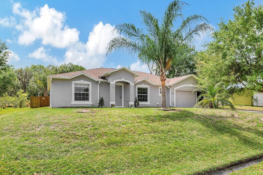 Photo of 1226 SW Calmar Avenue, Port Saint Lucie, FL 34953 (MLS # R10966582)
