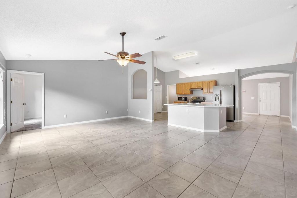 Photo of 1226 SW Calmar Avenue, Port Saint Lucie, FL 34953 (MLS # R10966582)