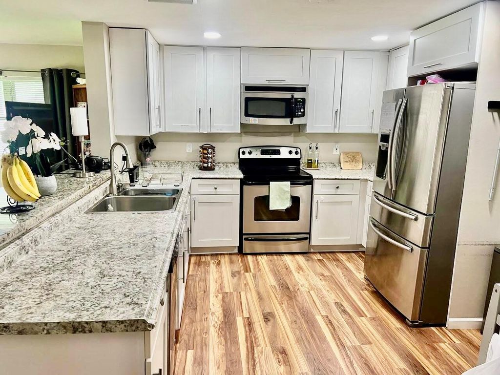 Photo of 609 NW 7th Court, Boynton Beach, FL 33426 (MLS # R11011908)