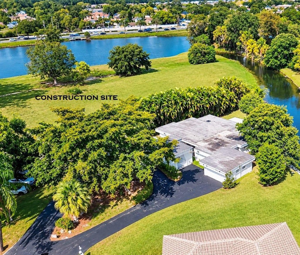 Photo of 5707 WHITE HICKORY Circle, Tamarac, FL 33319 (MLS # B26085400)