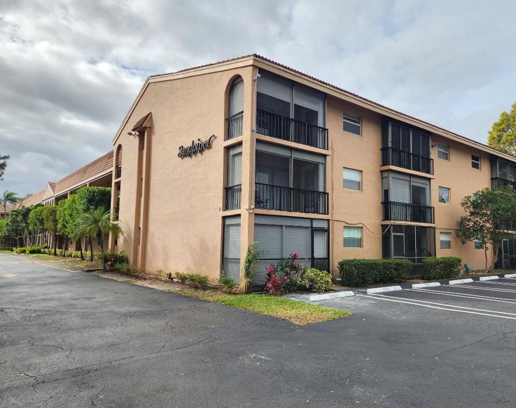 Photo of 2700 Coral Springs Drive #114, Coral Springs, FL 33065 (MLS # R10955706)