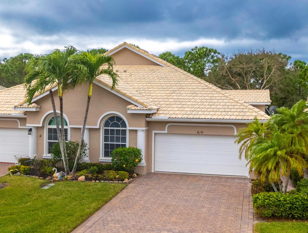 Photo of 610 NW Red Pine Way, Jensen Beach, FL 34957 (MLS # R10947803)