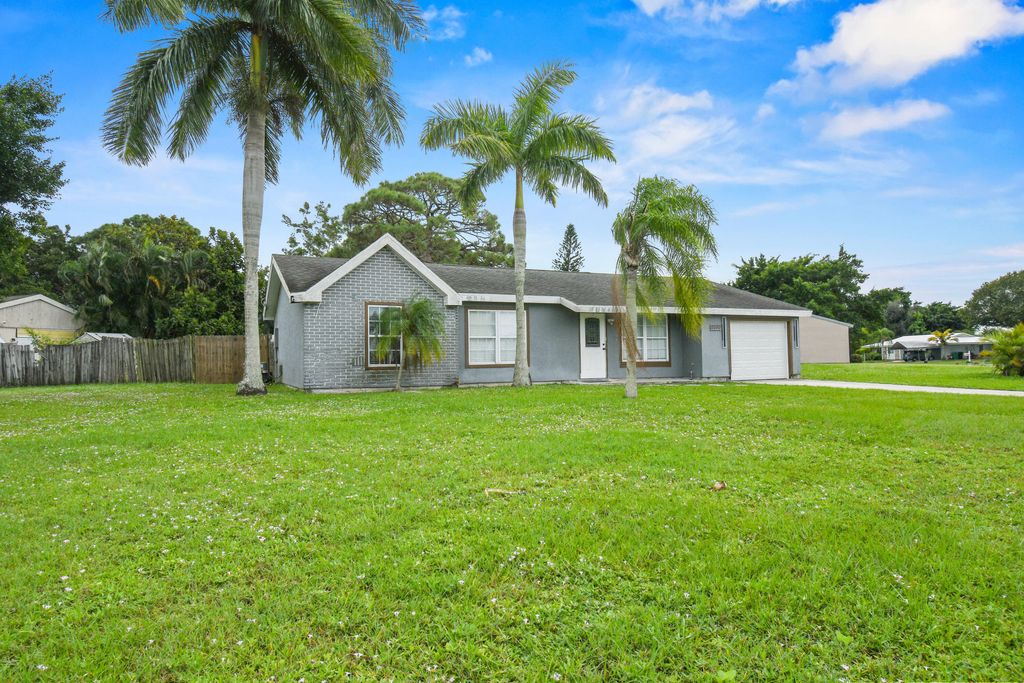Photo of 2079 SE Triumph Road, Port Saint Lucie, FL 34952 (MLS # R11139253)