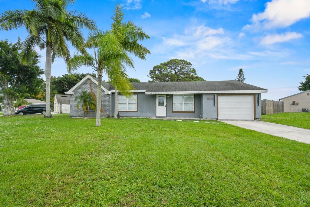 Photo of 2079 SE Triumph Road, Port Saint Lucie, FL 34952 (MLS # R11139253)